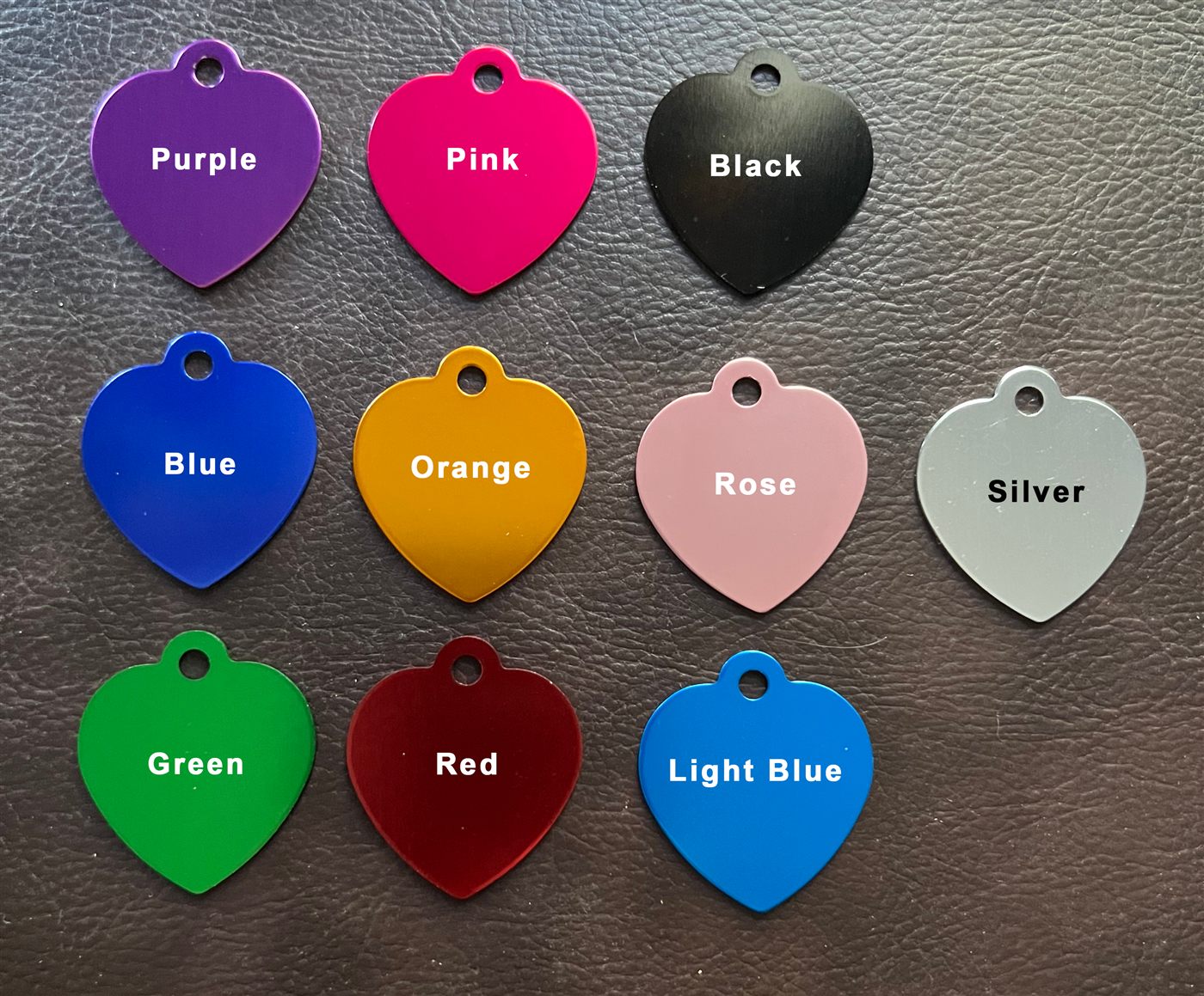 Heart-shaped pet ID tags in a range of colors